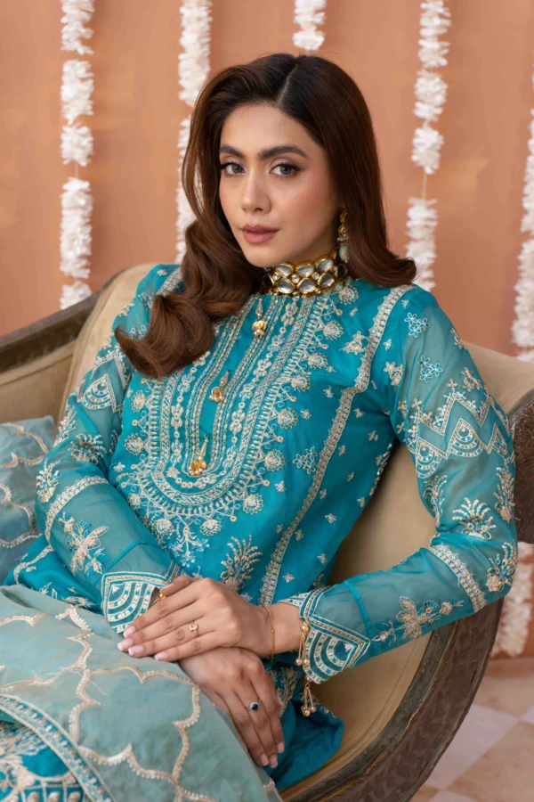 Luxurious Bamber Suit with Net Dupatta and Raw Silk Trousers
