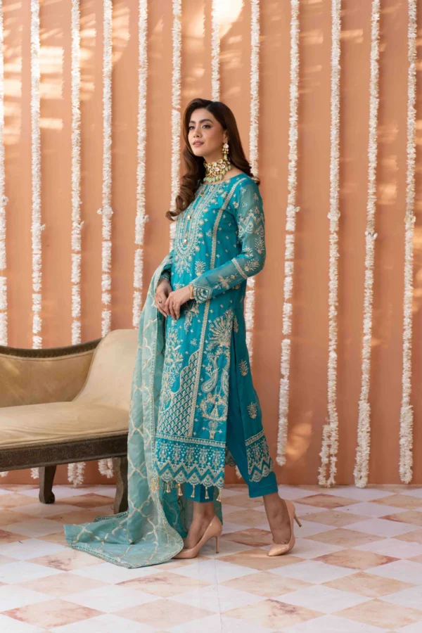 Luxurious Bamber Suit with Net Dupatta and Raw Silk Trousers