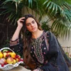 Aatiqa.com's Black Embroidered Lawn Unstitched 3-Piece Suit is a stunning choice for effortless elegance. This set features intricate floral embroidery on a premium lawn shirt, a plain trouser, and a matching dupatta, perfect for creating a custom-fit, sophisticated look.